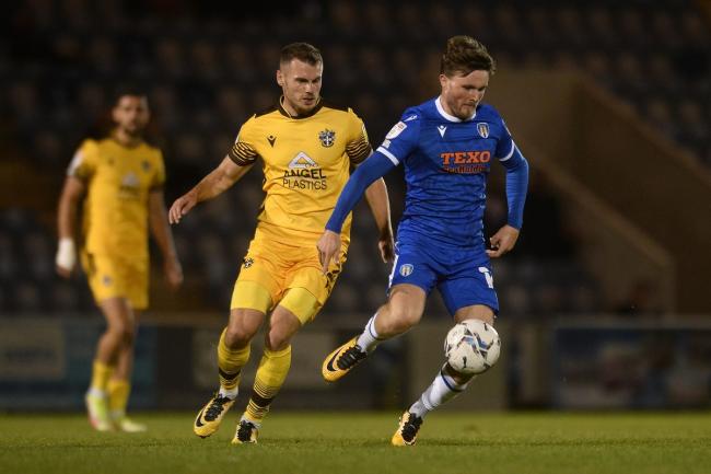 On the ball - Colchester United's Noah Chilvers looks to get past Jonathan Barden of Sutton United Picture: RICHARD BLAXALL