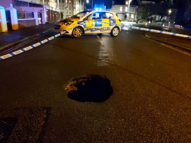 SIZEABLE SINKHOLE: A deep crater appeared in Church Road, Clacton