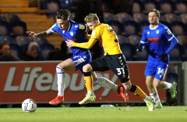 Full charge - Cameron Coxe in action for Colchester United against Newport County Picture: STEVE BRADING