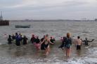 Brave - The swimmers take on the cold water at Harwich seafront