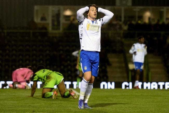 Anguish - Colchester United's Luke Hannant looks frustrated after seeing his late effort cleared off the line by Forest Green Rovers' Jordan Moore-Taylor Picture: RICHARD BLAXALL