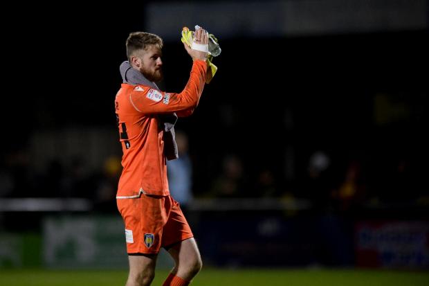 Safe hands - Jake Turner applauds the U's fans during his Colchester United loan spell Picture: RICHARD BLAXALL