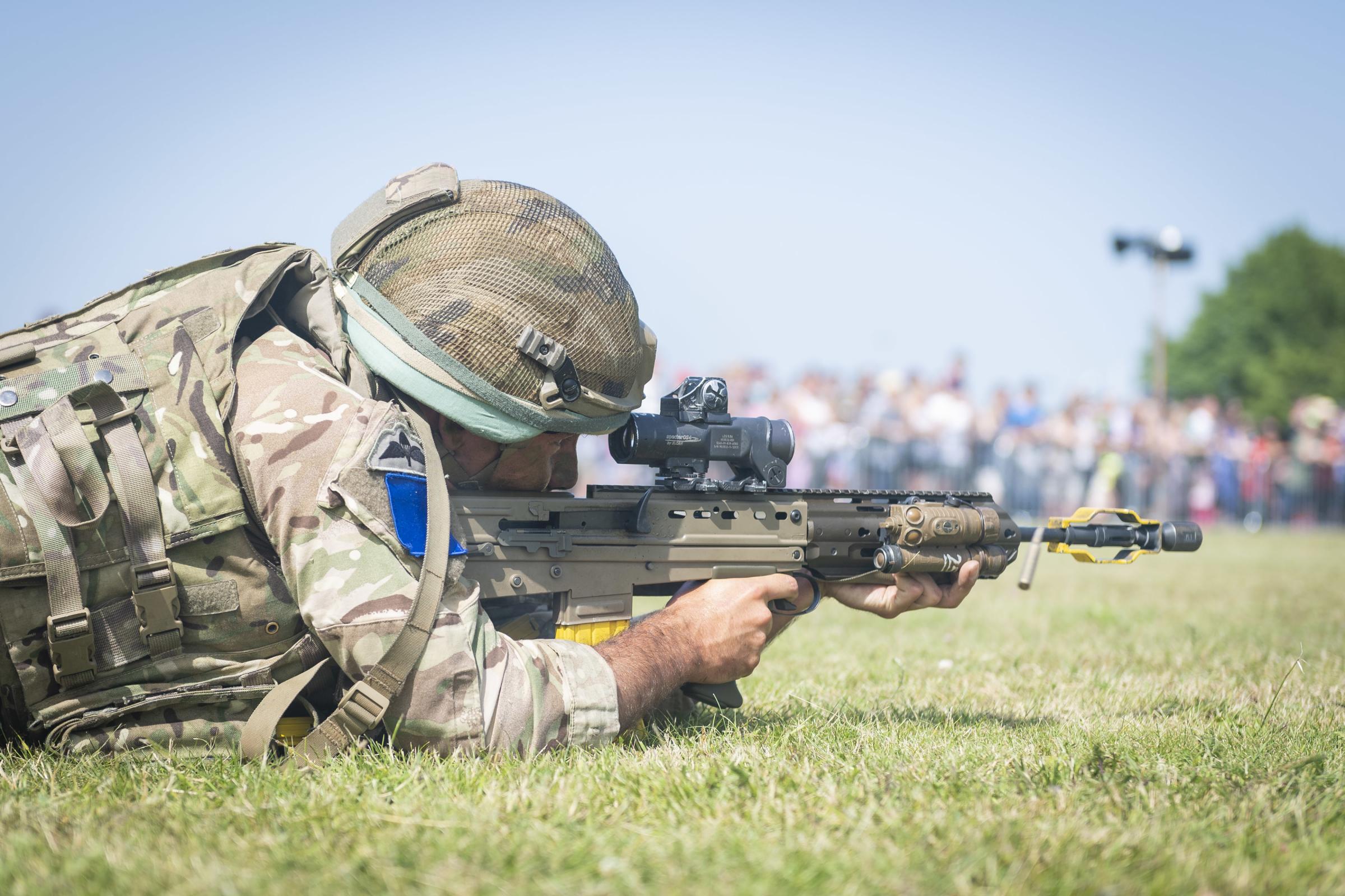 Aiming - a soldier taking part in a combat demonstration in the last event