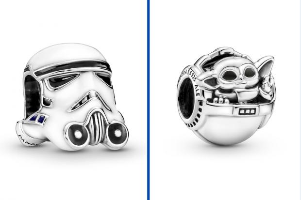 Gazette: (left to right) Stormtrooper charm and Grogu and crib charm. Credit: Pandora