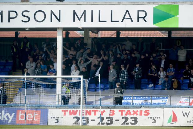 Backing - Colchester United fans get behind their side during the game at Hartlepool United, last weekend Picture: RICHARD BLAXALL
