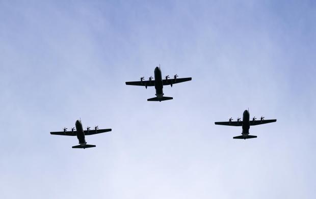 Gazette: Three C-130 Hercules are seen overhead as aircraft from the Royal Navy, British Army and Royal Air Force conduct a practice flypast. Picture: PA