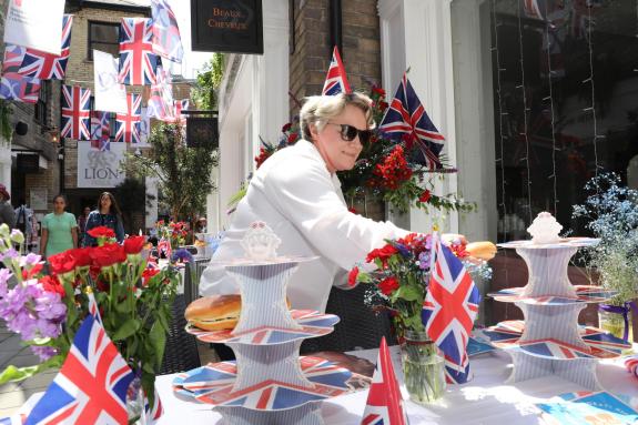Gazette: Leanne Dickson, loading the cake stands Gazette: Leanne Dickson, loading the cake stands