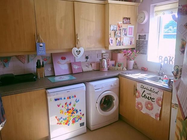 Gazette: Nikki's kitchen before it was redecorated. Picture: SWNS