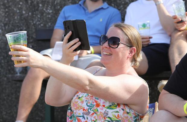 Gazette: Selfie - Sarah Moore records the event.