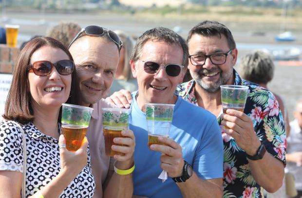 Gazette: Pints - Helen Shelley, Gary Blackwell, Dave Smithdale and Denis Harris are among those enjoying the Manningtree Beer Festival.