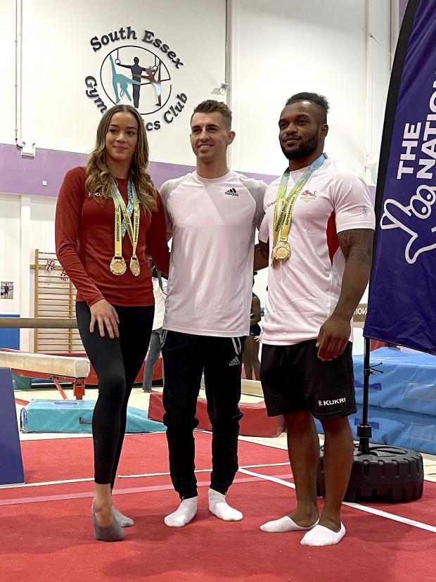 Gazette: Max Whitlock (centre), Georgia-Mae Fenton (left) and Courtney Tulloch at the South Essex Gymnastics Club (PA)