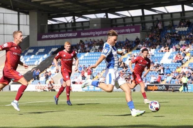 Hot shot - Colchester United midfielder Noah Chilvers fires his side into the lead against Carlisle United Picture: STEVE BRADING