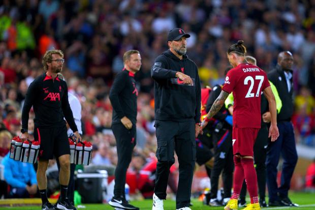 Liverpool's Darwin Nunez walks past manager Jurgen Klopp