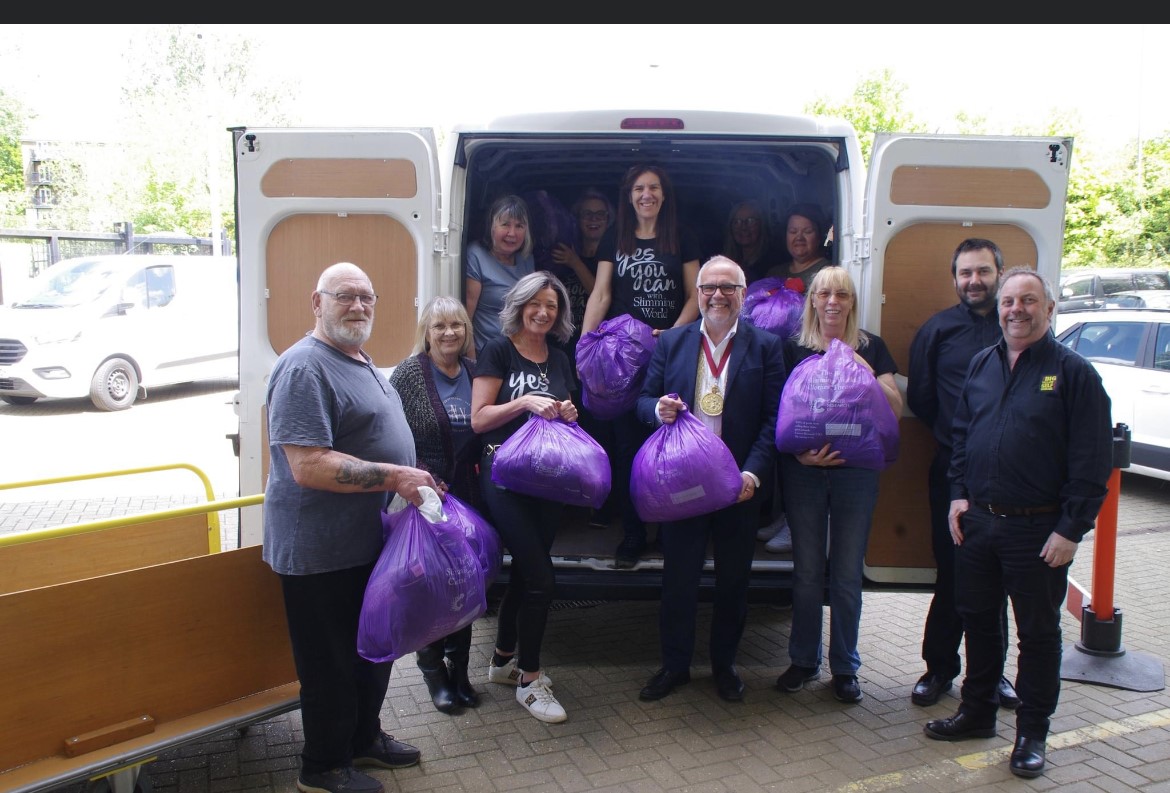 Colchester slammers donate clothes for Cancer Research UK - Vimarsana News