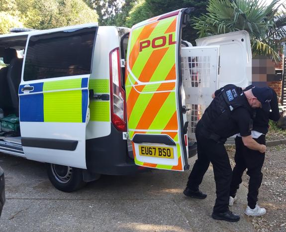 Gazette: Handcuffs - one of the youngsters is arrested in Colchester Gazette: Handcuffs - one of the youngsters is arrested in Colchester