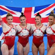 Great Britain's Alice Kinsella, Jennifer Gadirova, Jessica Gadirova and Amelie Morgan celebrate winning bronze after the Women's Team Final at the Ariake Gymnastics Centre on the fourth day of the Tokyo 2020 Olympic Games in Japan