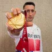 Glory - Colchester-born high jumper Jonathan Broom-Edwards with his gold medal won at the 2020 Paralympic Games, in Tokyo Picture: NAFEES DARADIA