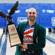 Proud - Dominic Barrett with his trophy after winning the US Open for bowling