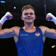 Main man - England's Lewis Richardson celebrates victory against Uganda's Yusuf Nikobeza at the Commonwealth Games in Birmingham Picture: PETER BYRNE/PA WIRE