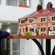 Famed Essex artist Grayson Perry unveils new work - a dolls' house with a difference