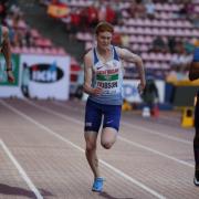 Controversy - Colchester Harriers sprinter Charlie Dobson (centre) suffered frustration at the UK Athletics Indoor Championships