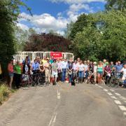 Fight - campaigners stand in front of the now closed-off Boxted Bridge