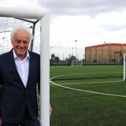 Sporty - Councillor Mick Barry beside the new 3G football pitches at Clacton Leisure Centre