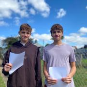 Superstars - Twins Joseph and Thomas Partridge, standing proudly with their results