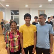 Proud - Nithilan Raghunathan with his parents after collecting his GCSE results
