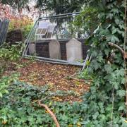 Upset - temporary fencing was left across gravestones near Lion Walk Shopping Centre