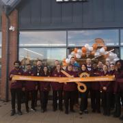 Celebration - The staff of Sainsbury's Local before the ribbon was cut