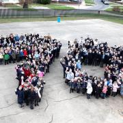 Landmark - Iceni Academy pupils, staff, and infants celebrate 70 years