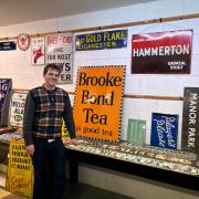 Smiles - Tom Flatt from Reeman Dansie pictured with some of the signs