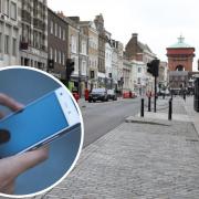Phone signal - Colchester Highstreet and a photo of someone using their mobile