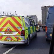Emergency - an ambulance navigating through traffic to get to the scene
