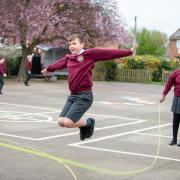 Fun - pupils enjoying some skipping outside