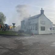 Local village pub seen in flames