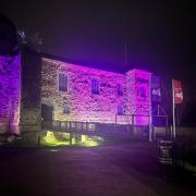 Colchester Castle and Town Hall shone in pink, blue and purple for World Autism Acceptance Week
