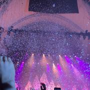 The crowd is showered with confetti at Alexandra Palace
