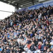 Fan power - Colchester United fans cheer on their team against Crewe Alexandra at the JobServe Community Stadium