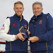 Memorable month - Essex fast bowler Jamie Porter (left) is presented with his Player of the Month award by Essex head coach Chris Silverwood