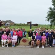 Special occasion - ladies' captain Brenda Lord (seated in the black top) before the start of her Ladies' Day