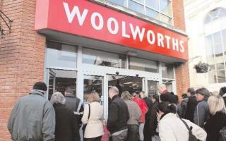 Shoppers queue to get into Woolworths as its closing down sale in Colchester begins