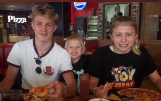 Family - Freddie with brother Jack, 20, and sister Sophie, 19, enjoying a family meal out