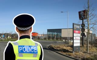 Action - police have arrested a woman in connection with shoplifting at Stane Retail Park