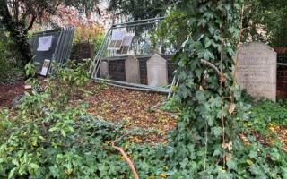 Upset - temporary fencing was left across gravestones near Lion Walk Shopping Centre