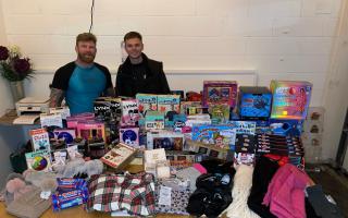 Generosity - James Webb (Left) and Lewis Richardson (Right) with the gifts the community donated after Lewis' boxing masterclass