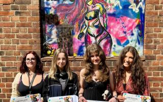 Talented - four members of Colchester sixth form college stood infront of a new piece of art down Osborne Street