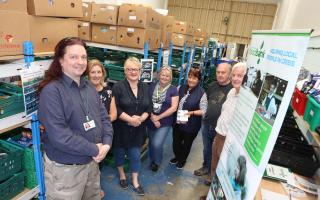 Appeal - Manager Mike Beckett with volunteers at Colchester Foodbank