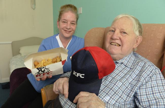 Ron Stone, resident at The Corner House care home in Clacton with care worker Lynda Green who took Ron the KFC to see the workings behind the scenes.